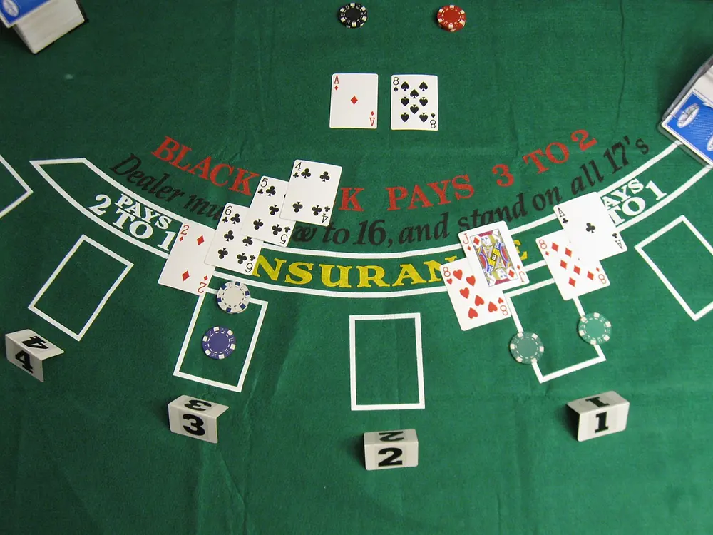 blackjack hand on felt